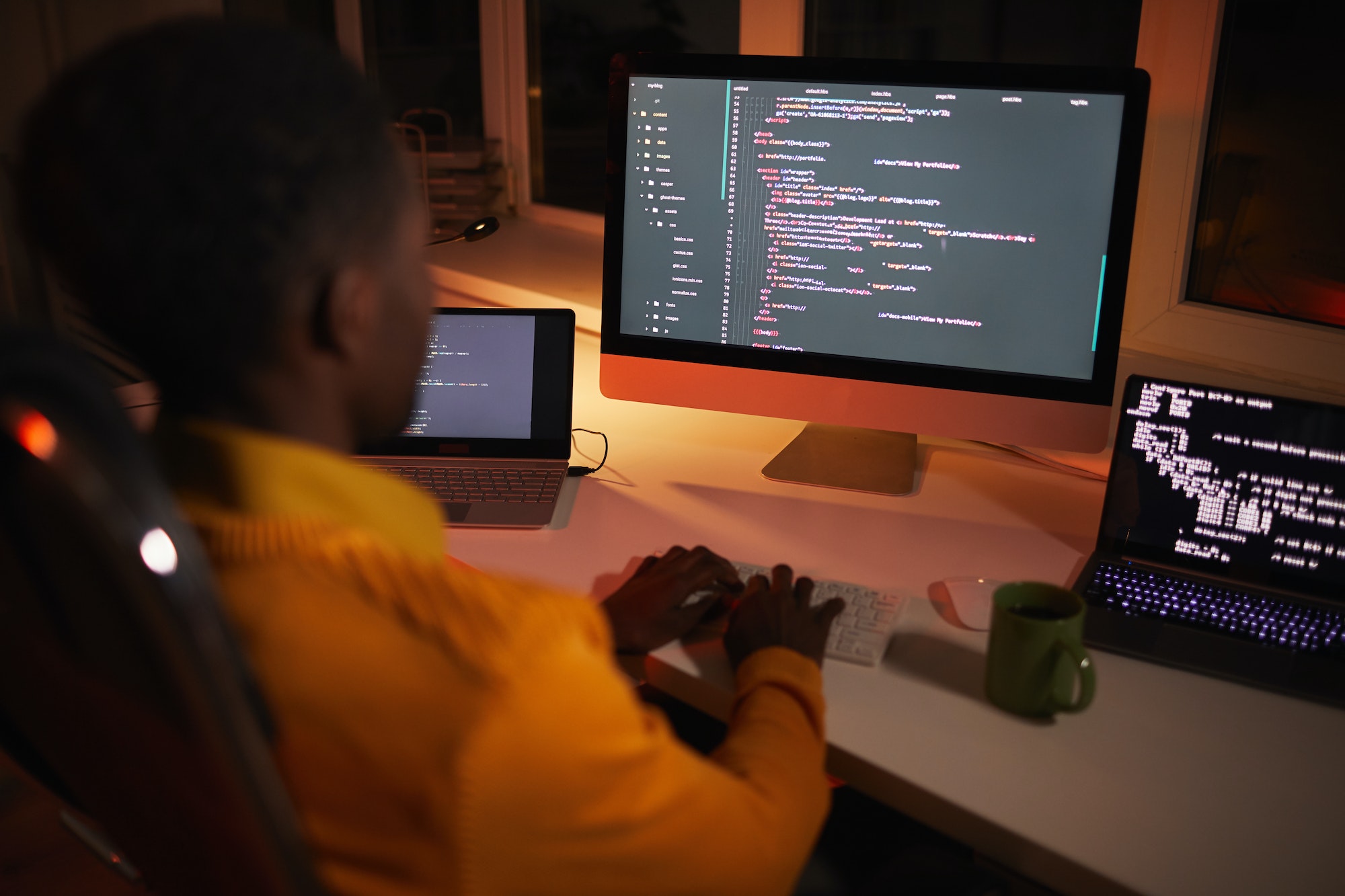 African-American IT Developer Writing Code